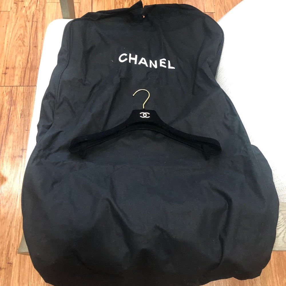 Chanel full size garment bag and hanger.